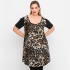 A23-6076 Brown blousedress with pattern on the front and black on the back and the sleeves